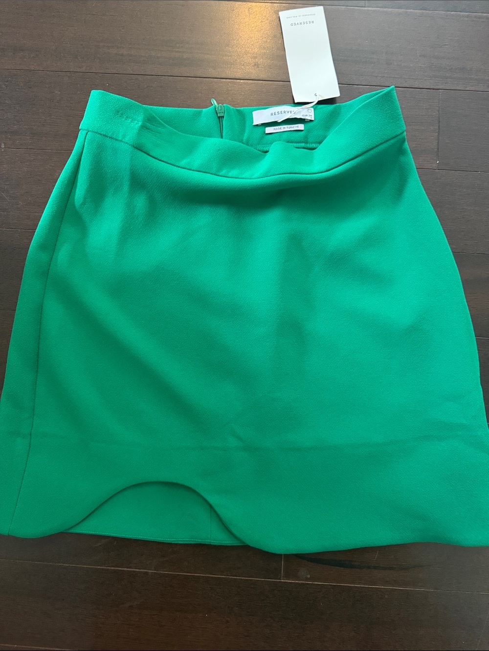 Reserved emerald green scallop hem mini skirt